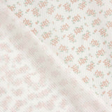 Popeline de algodão com padrão floral pequeno em coral - Ribes y Casals