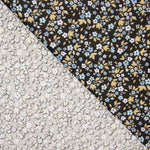 Percal de algodão com estampado floral sobre fundo preto - Ribes y Casals