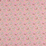 Percal estampado com ramos de flores sobre fundo rosa - Ribes y Casals