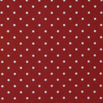 Lona estampada com bolinhas brancas sobre fundo granada - Ribes y Casals