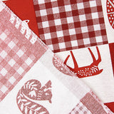 Loneta estampada com motivos natalícios em patchwork nórdico - Ribes y Casals