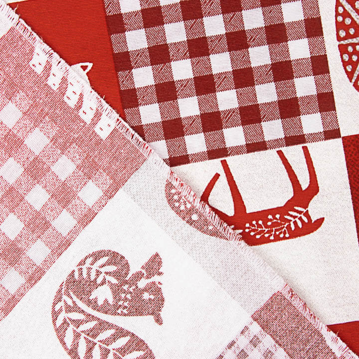 Loneta estampada com motivos natalícios em patchwork nórdico - Ribes y Casals