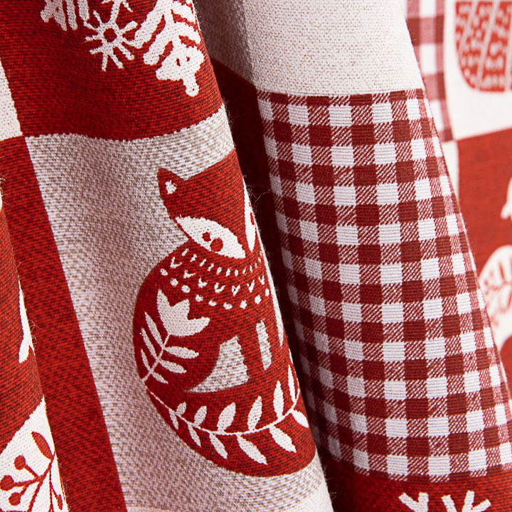 Loneta estampada com motivos natalícios em patchwork nórdico - Ribes y Casals