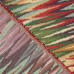 Gobelino Ikat com riscas multicoloridas em tons quentes - Ribes y Casals
