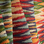 Gobelino Ikat com riscas multicoloridas em tons quentes - Ribes y Casals