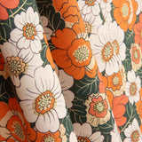 Popeline de algodão estampado com flores retro laranja - Ribes y Casals