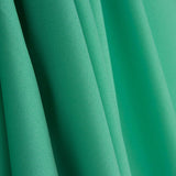Casaco de gabardine elástico liso verde-água-marinha - Ribes y Casals