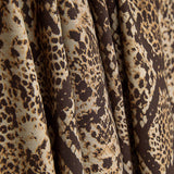 Tecido de viscose estampado de dupla face com animal print de cobra castanha - Ribes y Casals