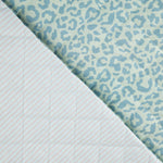 Tecido acolchoado reversível Nairobi azul com animal print e riscas - Ribes y Casals