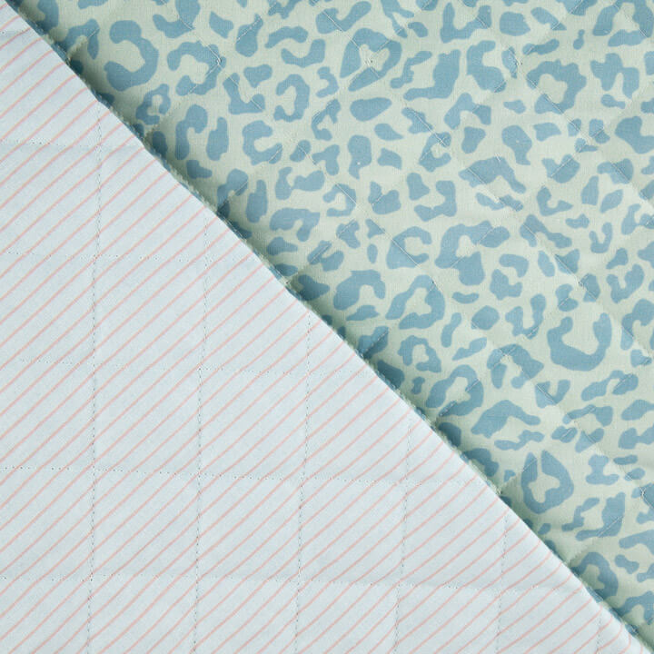 Tecido acolchoado reversível Nairobi azul com animal print e riscas - Ribes y Casals