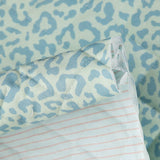 Tecido acolchoado reversível Nairobi azul com animal print e riscas - Ribes y Casals