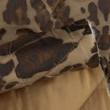 Manta leve dupla face com animal print e ocre - Ribes y Casals