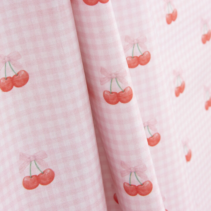 Percal estampado com cerejas em padrão xadrez vichy rosa - Ribes y Casals
