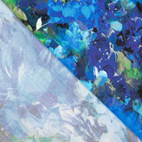 Viscose acetinada estampada com flores azul oceano - Ribes y Casals