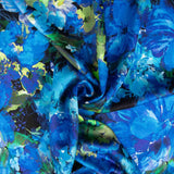 Viscose acetinada estampada com flores azul oceano - Ribes y Casals