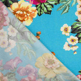 Viscose estampada com flores de jardim turquesa - Ribes y Casals
