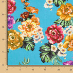 Viscose estampada com flores de jardim turquesa - Ribes y Casals