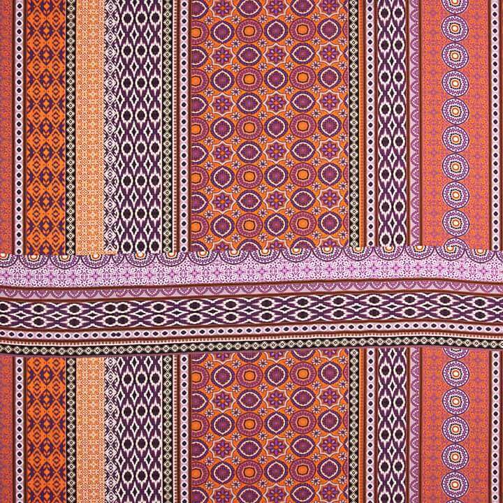 Viscose estampada com motivos étnicos, riscas em laranja e roxo - Ribes y Casals
