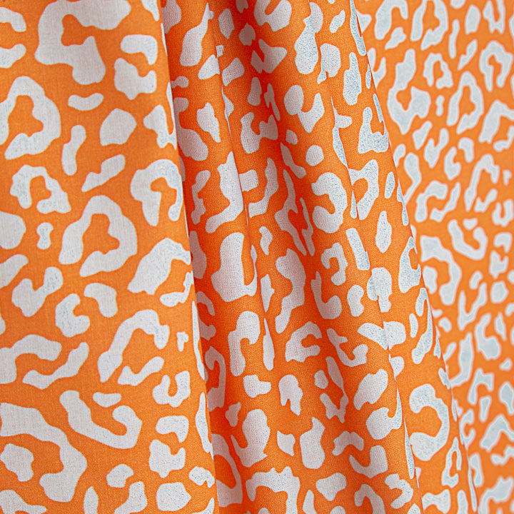 Percal estampado Nairobi laranja e azul claro - Ribes y Casals
