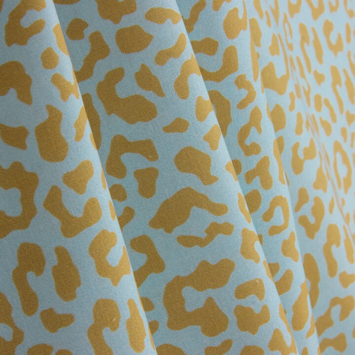 Percal estampado Nairobi mostarda azul - Ribes y Casals