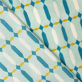 Viscose estampada com motivos geométricos verde-água - Ribes y Casals