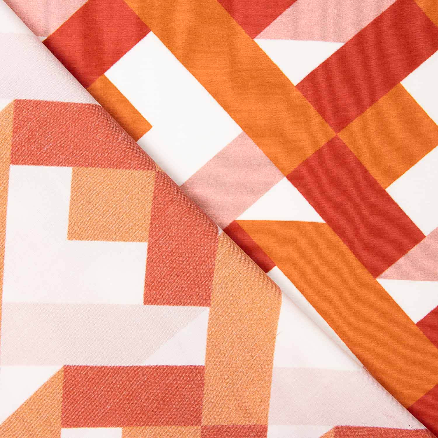 Viscose estampada com motivos geométricos em laranja e coral - Ribes y Casals
