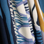 Viscose estampada com motivos geométricos em azul e mostarda - Ribes y Casals