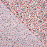 Popeline de algodão orgânico estampado com mil flores cor-de-rosa - Ribes y Casals