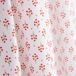 Popeline de algodão orgânico estampado com ramos vermelhos - Ribes y Casals