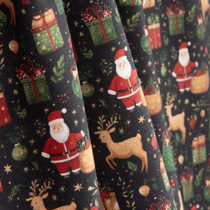 Popelina estampada com motivos natalícios: Pai Natal e renas - Ribes y Casals