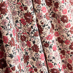 Sarja de viscose com padrão de flores em rosa e bordô - Ribes y Casals