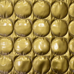 Couro envernizado dourado acolchoado - Ribes y Casals