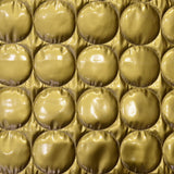 Couro envernizado dourado acolchoado - Ribes y Casals