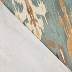 Loneta com efeito de tecido de linho Ikat oriental azul esverdeado - Ribes y Casals