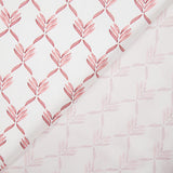Percal estampado com folhas geométricas em coral - Ribes y Casals
