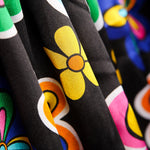 Cetim Carnaval Flor Hippie Preto - Ribes y Casals