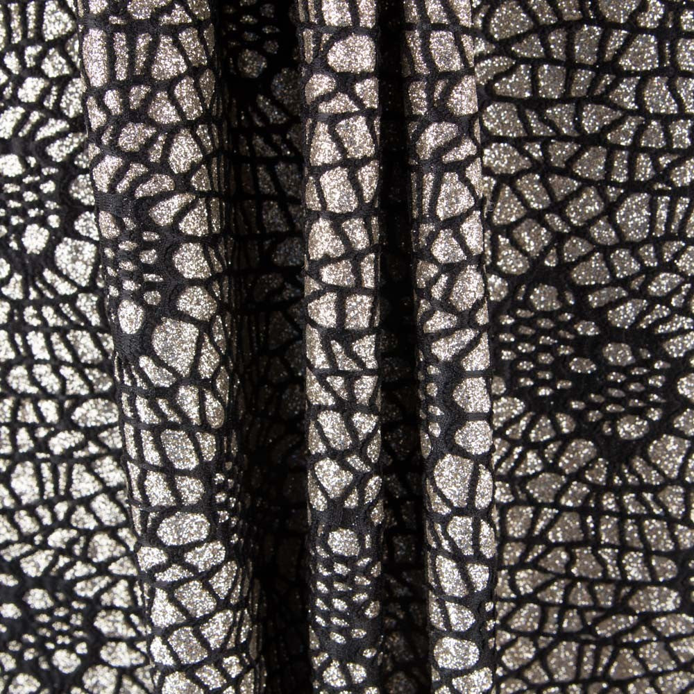 Tecido Lamé Aranha Ouro - Ribes y Casals