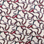 Tecido Loneta Laços Natalício Cru - Ribes y Casals