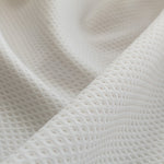 Tecido Piquê Olho de Perdiz Bege - Ribes y Casals