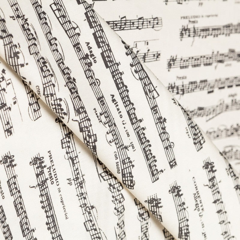 Tecido de Popelina Algodão Notas Musicais Cru - Ribes y Casals
