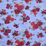 Tecido Viscose Rosas Fundo Azul Empoado - Ribes y Casals